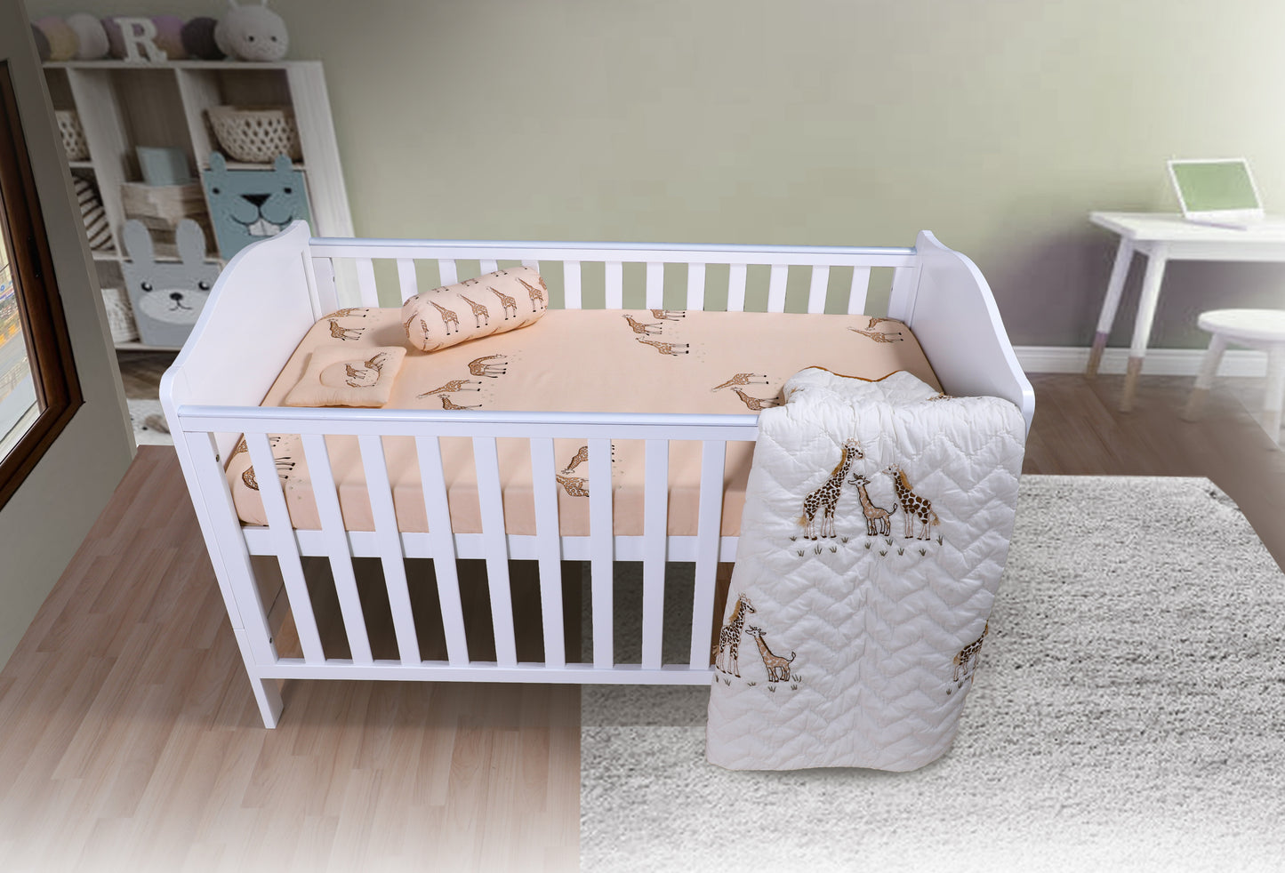 White crib with baby bedding in a nursery setting