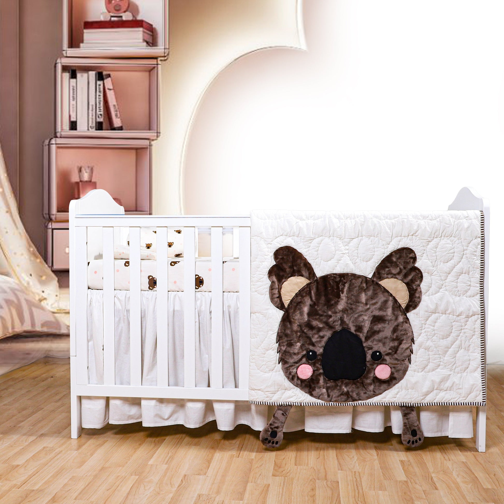Crib with a bear face design in a nursery setting