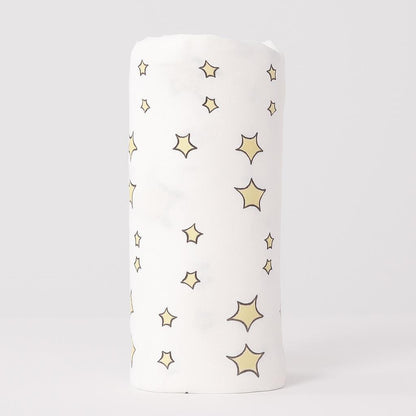 White cylindrical container with star patterns on a light gray background