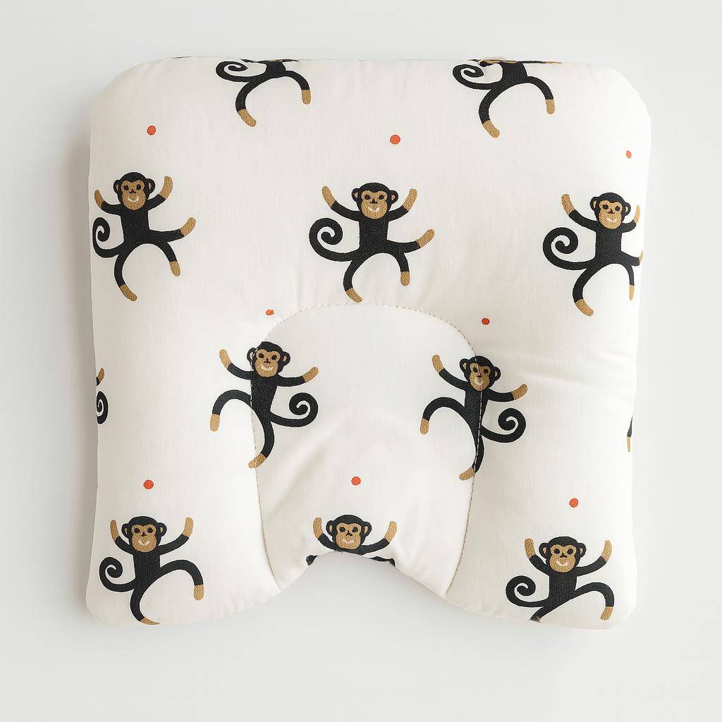Pillow with monkey pattern on a white background