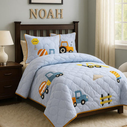 Children's bedroom with construction-themed bedding and decor.