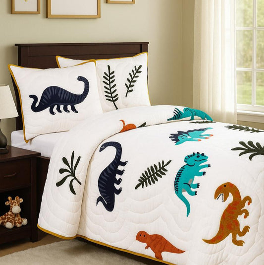Children's bedroom with dinosaur-themed bedding and wall art.
