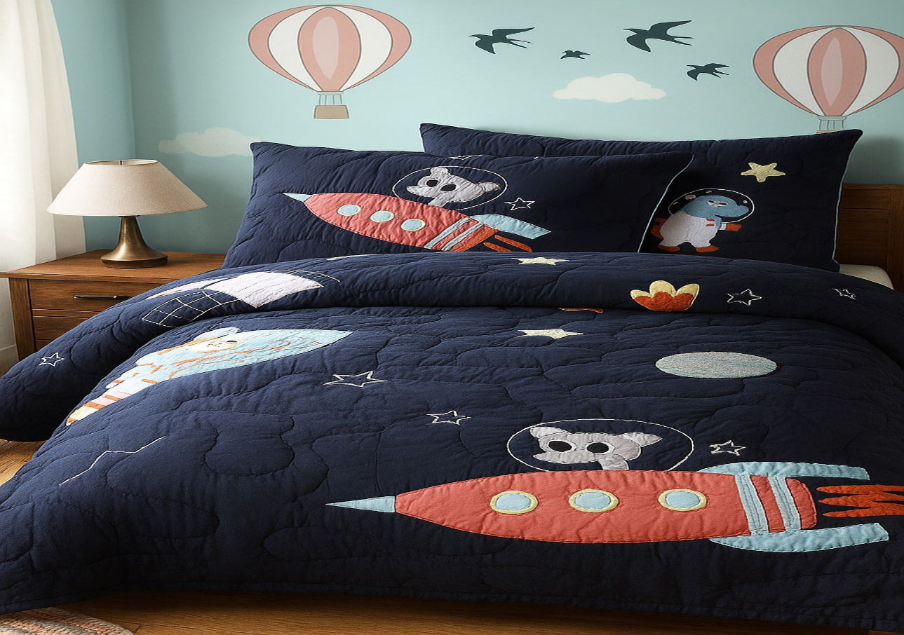 Children's bedroom with space-themed bedding featuring rockets and astronauts.