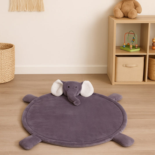 Children's room with a purple elephant-shaped rug on the floor, a wooden shelf with toys, and a wall hanging.